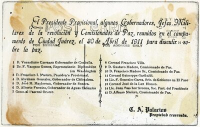 Fotografía de Francisco I. Madero con un grupo de gobernadores, jefes militares, y comisionados de paz en Ciudad Juárez, verso