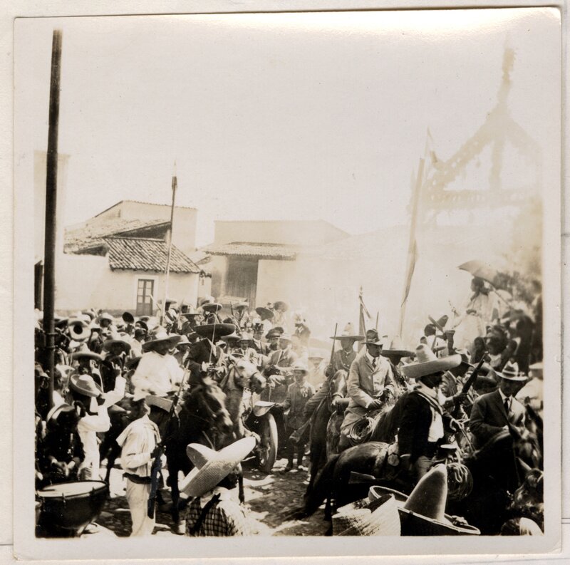 "Emiliano Zapata mounted, white sombrero, heading parade"